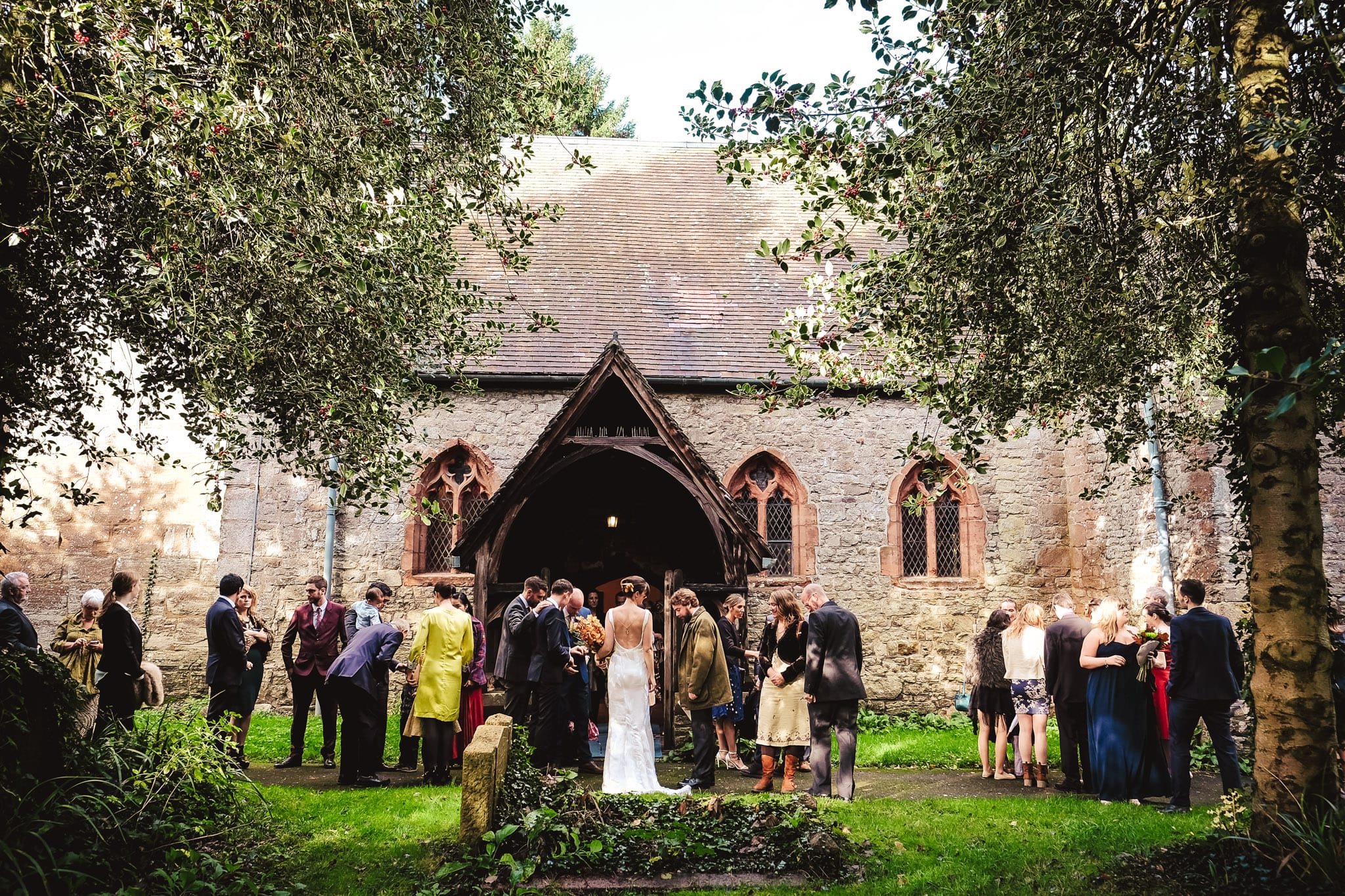 Wedding party outside the church at a Birtsmorton Court Wedding 