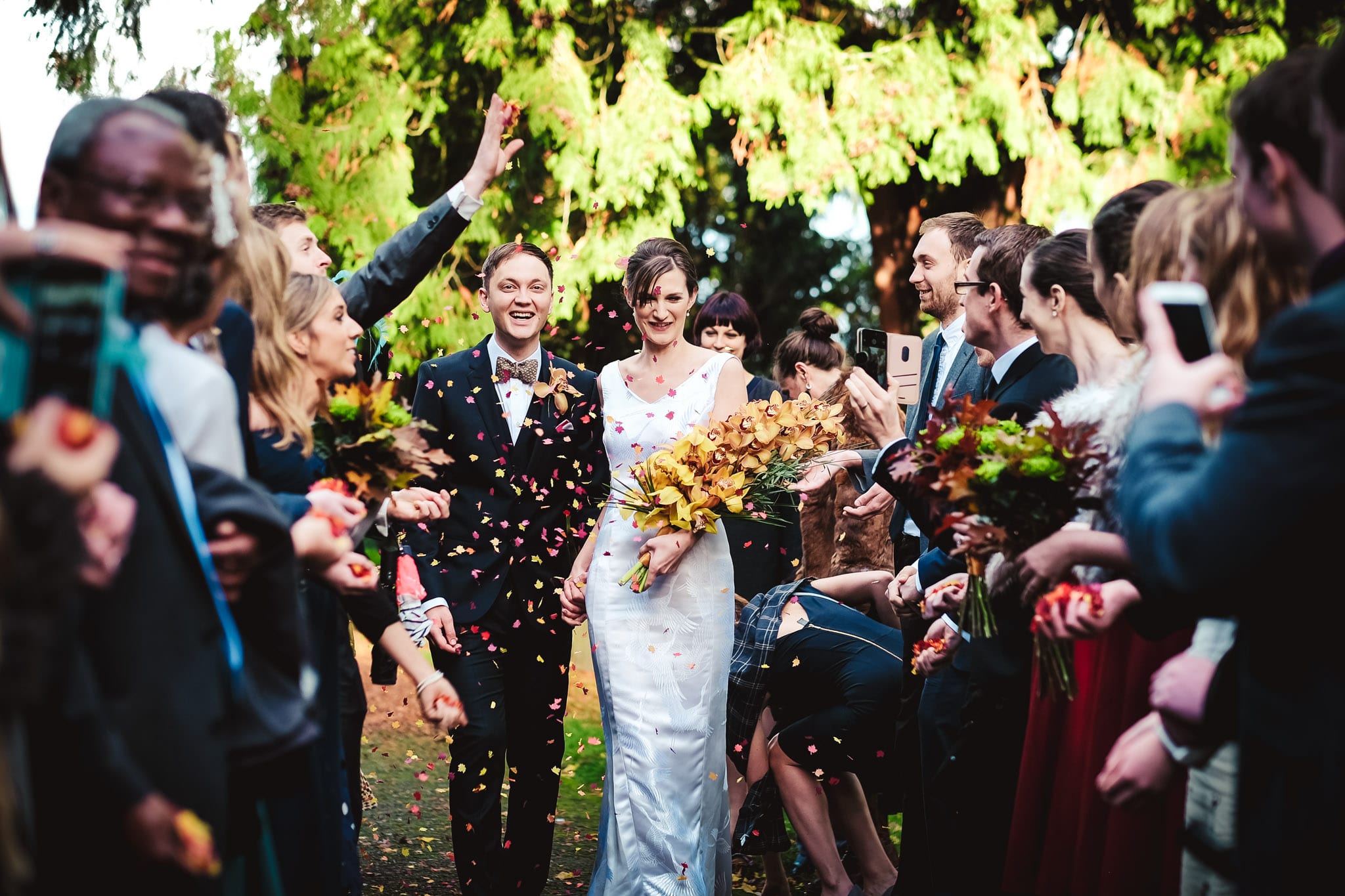 Bride and groom and confetti at a Birtsmorton Court Wedding