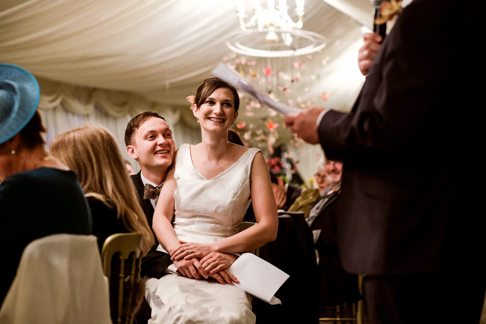 Bride laughing during speeches at a Birtsmorton Court Wedding