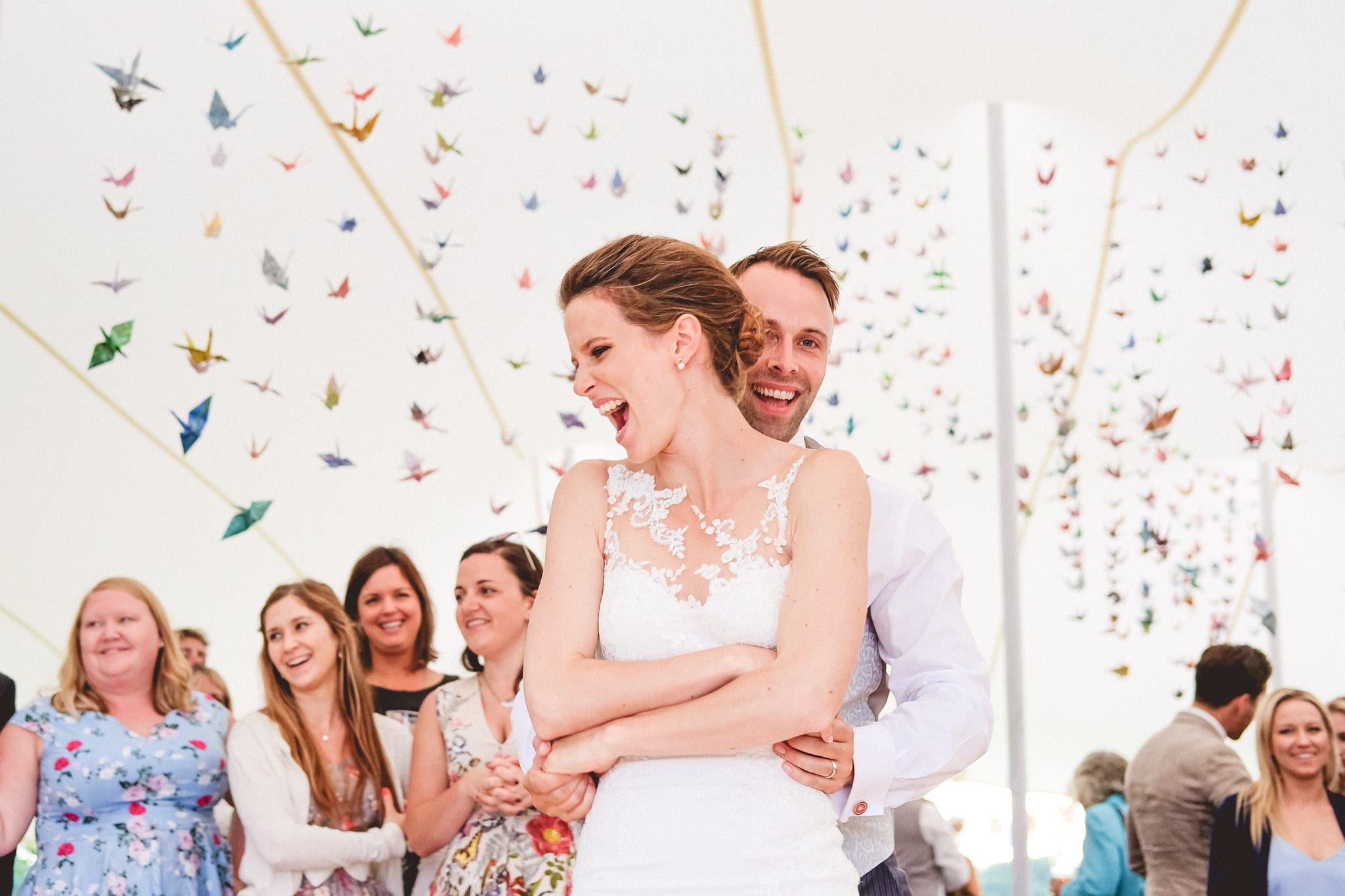 Bride and groom first dance in a marquee wedding