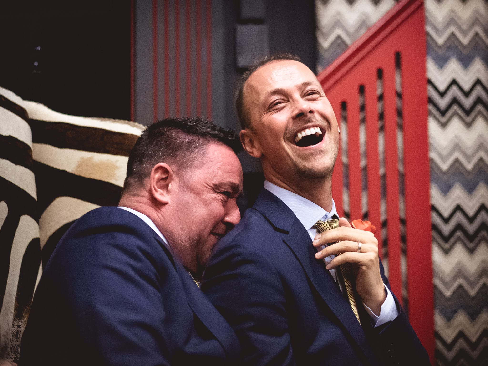 The Grooms laughing at a gay wedding in London