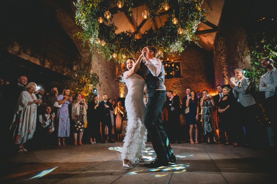 Bride and groom first dance at a Stone Barn wedding in The Cotswolds