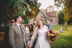 Bride and groom and confetti at a wedding at a Birtsmorton Court wedding in Worcestershire