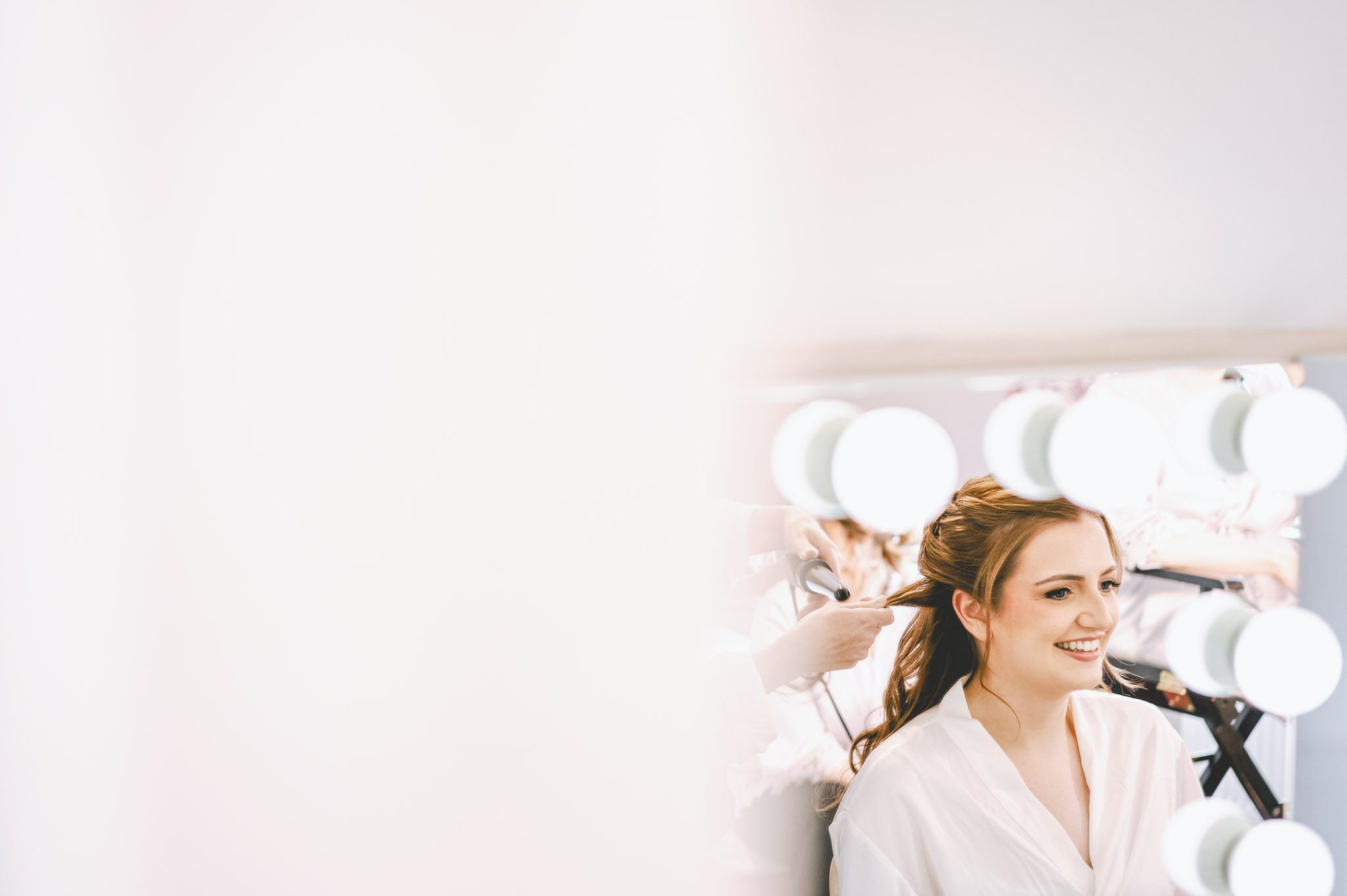 Bride getting ready at a wedding at a Birtsmorton Court wedding in Worcestershire