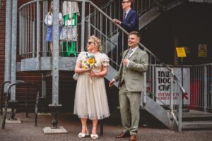 Bride and groom outside their Mud Dock Cafe wedding in Bristol