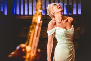 Bride smiling on the dance floor at a Pennard House wedding in Somerset