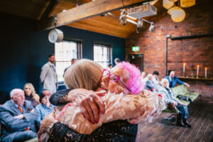 Hugs before the ceremony at a relaxed Chimney House wedding in Sheffield
